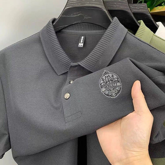 Timeless Tactile: Embossed Emblem Polo